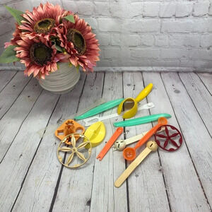 vintage Tupperware assortment of kitchen gadgets and parts